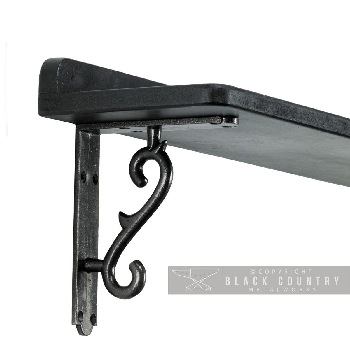 Black Scroll Shelf Bracket in Situ Holding a Wooden Shelf