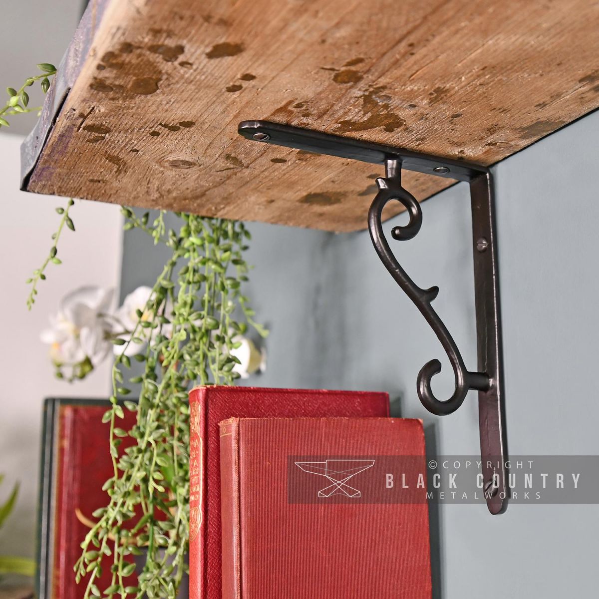 Scroll Effect Wall Bracket Finished in Black