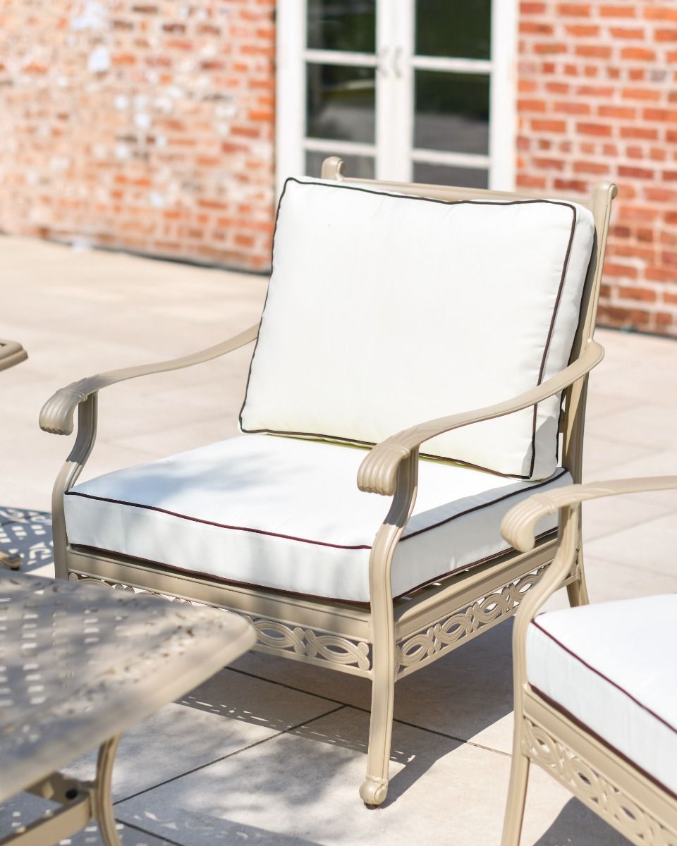 Close up shot of the single seater chair with cushions.