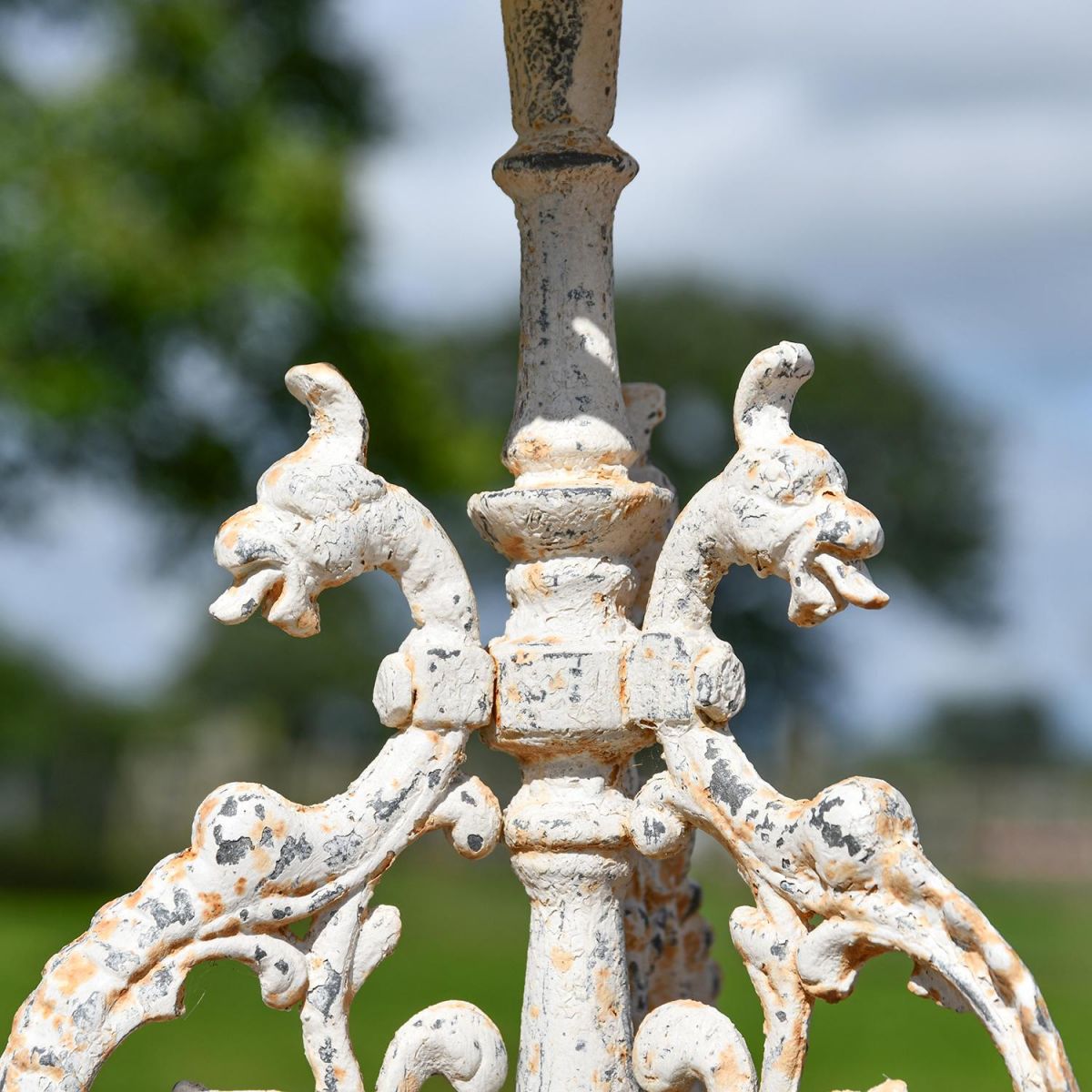 Serpent Design on the Cast Iron Side Table Serpent Design on the Cast Iron Side Table