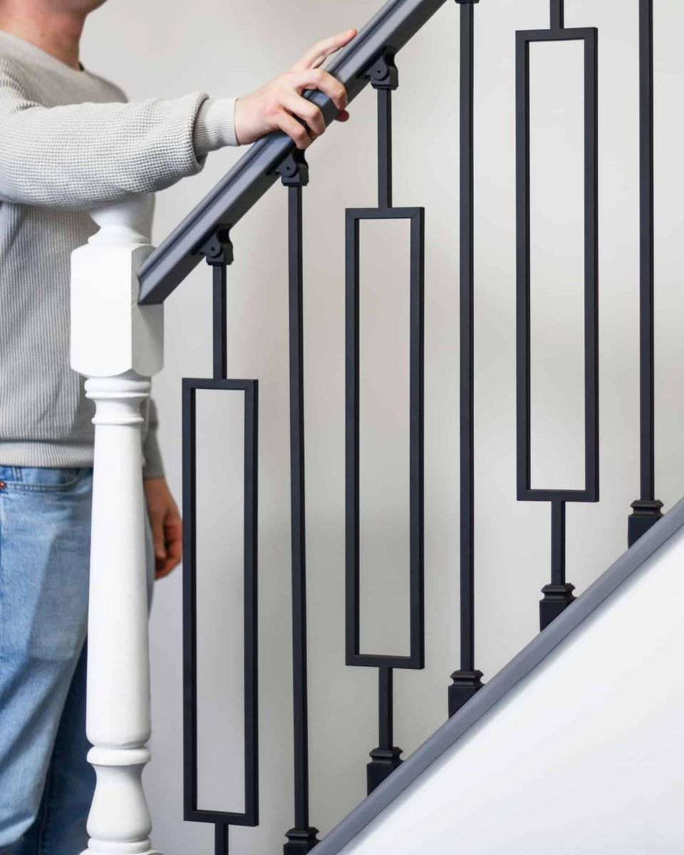Scale Shot of Set of 2 Matte Black "Enfield" Steel Stair Spindles - Pattern 10