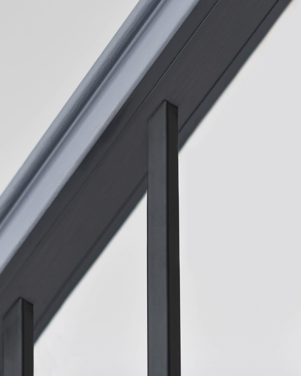 Close-Up of Fitting for Set of 2 Matte Black "Enfield" Steel Stair Spindles - Pattern 11