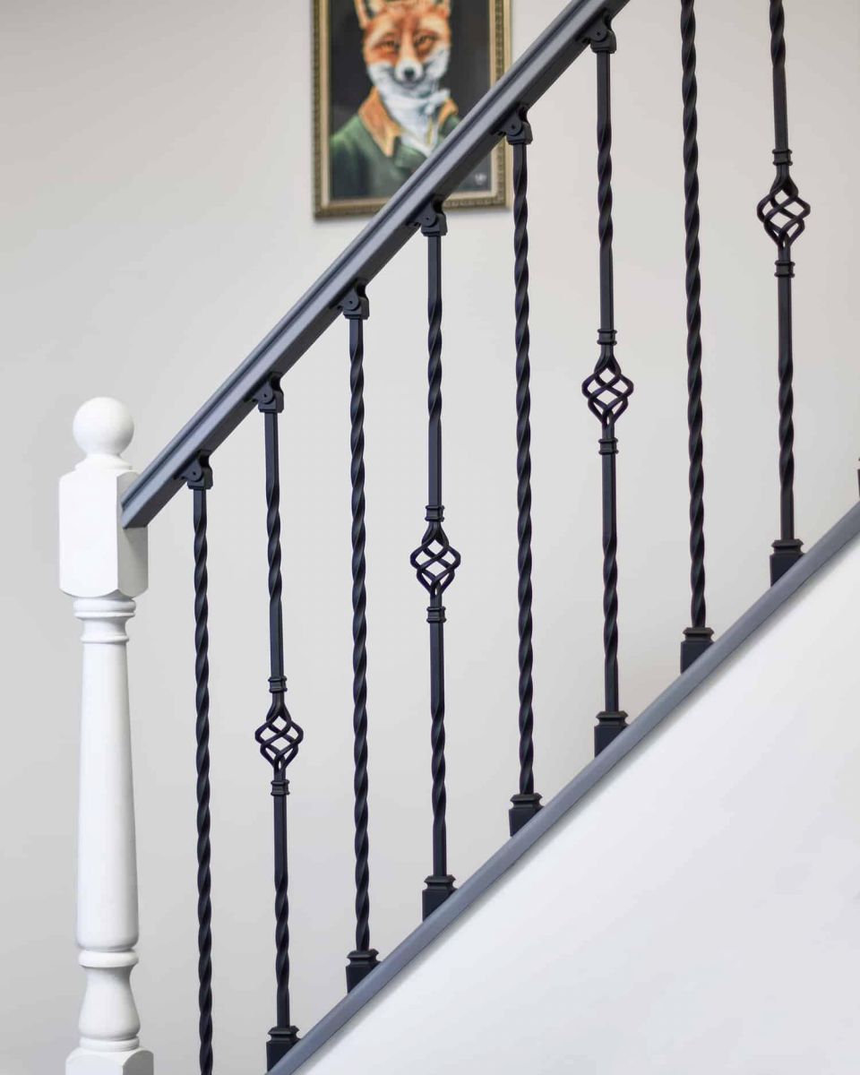 Set of 2 Matte Black "Enfield" Steel Stair Spindles - Pattern 13 in Situ