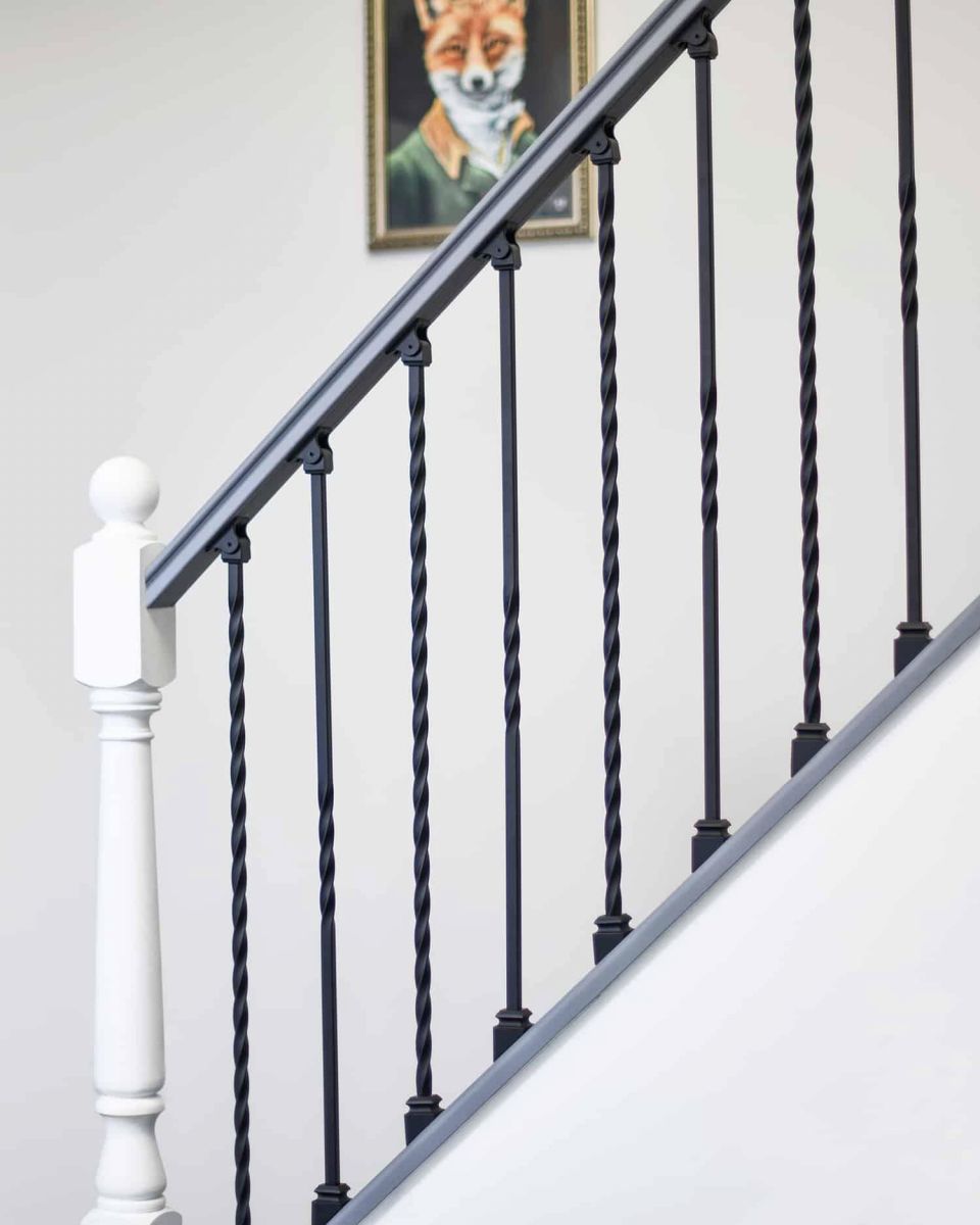 Set of 2 Matte Black "Enfield" Steel Stair Spindles - Pattern 15 in Situ