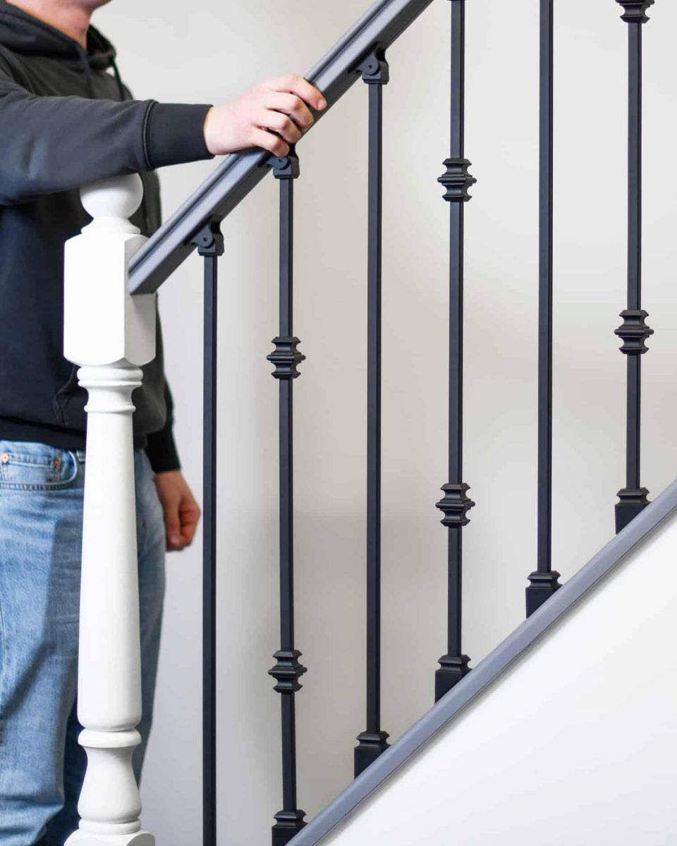 Scale Shot of Set of 2 Matte Black "Enfield" Steel Stair Spindles - Pattern 3