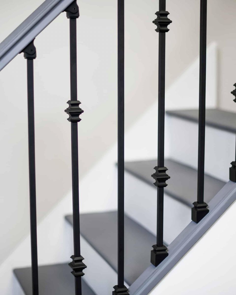 Situ Shot of Set of 2 Matte Black "Enfield" Steel Stair Spindles - Pattern 3