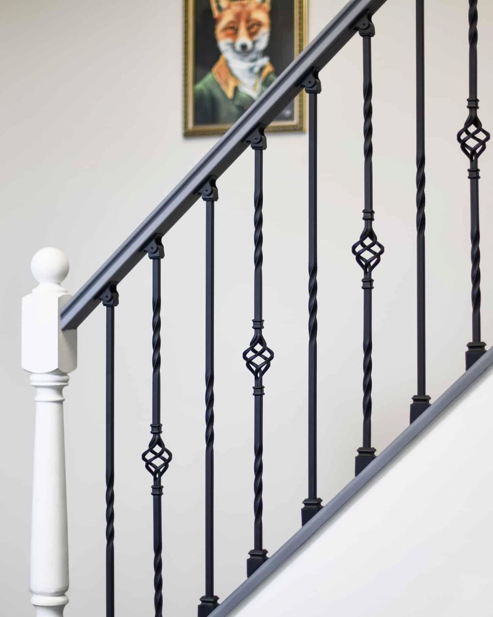 Set of 2 Matte Black "Enfield" Steel Stair Spindles - Pattern 5 in Situ