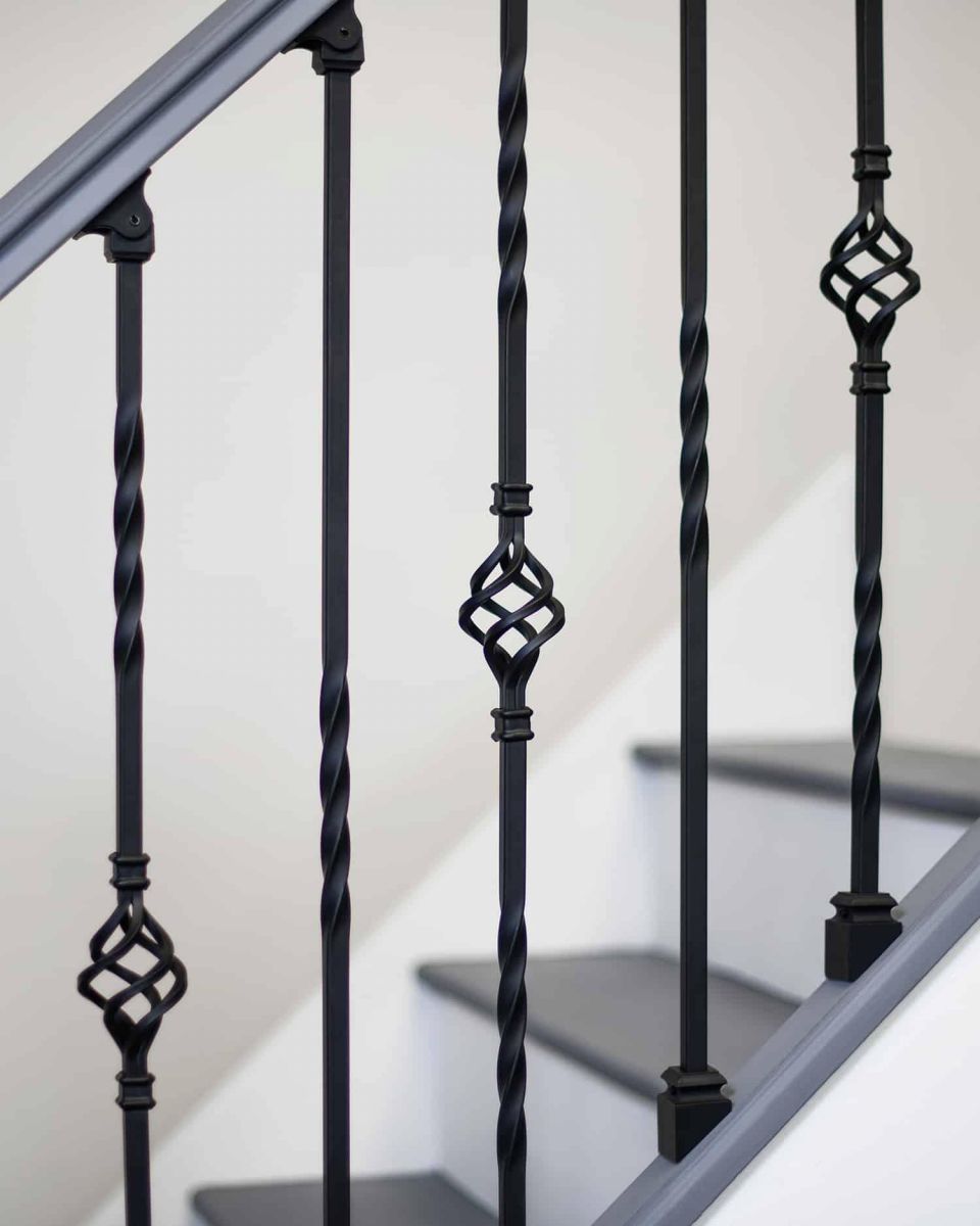 Close-Up of Set of 2 Matte Black "Enfield" Steel Stair Spindles - Pattern 5