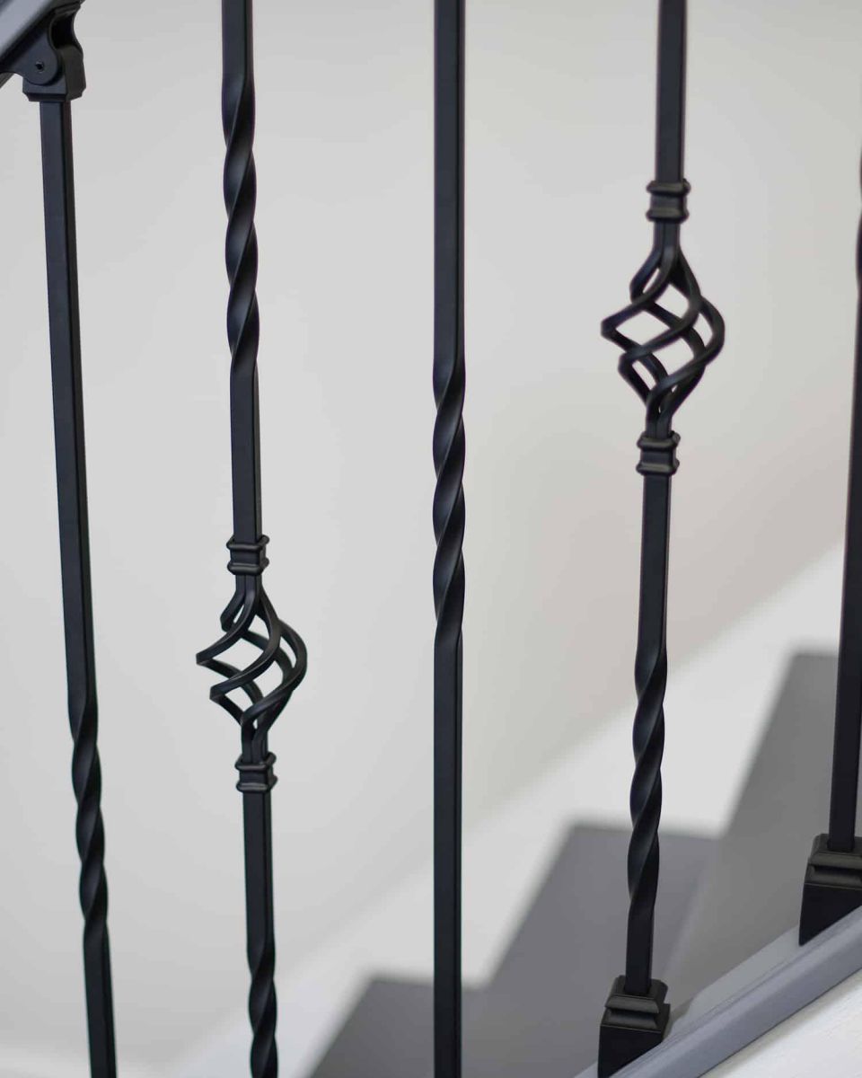 Close-Up of Set of 2 Matte Black "Enfield" Steel Stair Spindles - Pattern 5