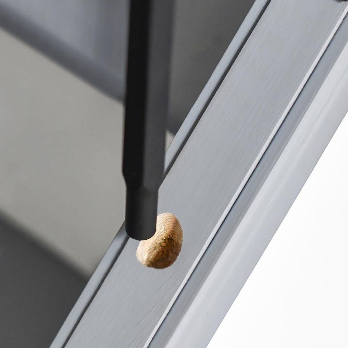 Close-Up of Lower Fitting for Set of 2 Matte Black "Enfield" Steel Stair Spindles - Pattern 9