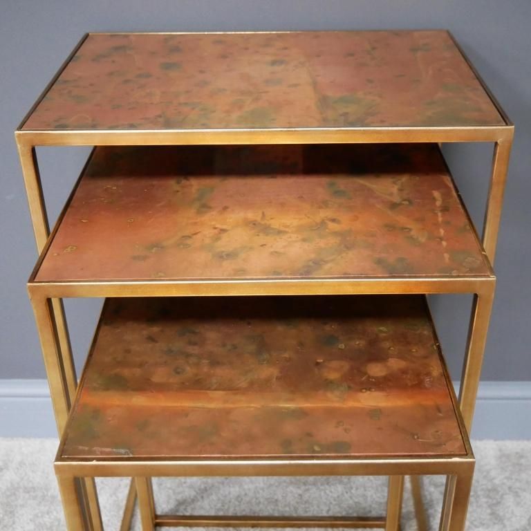 Close-Up of Individual Side Tables in Copper Finish Close-Up of Individual Side Tables in Copper Finish
