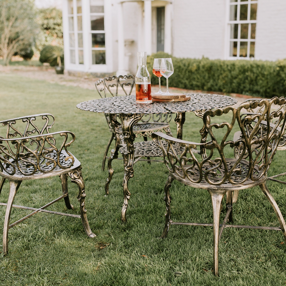 Close up of "Edworth Manor" Dining Set in Brushed Gold 