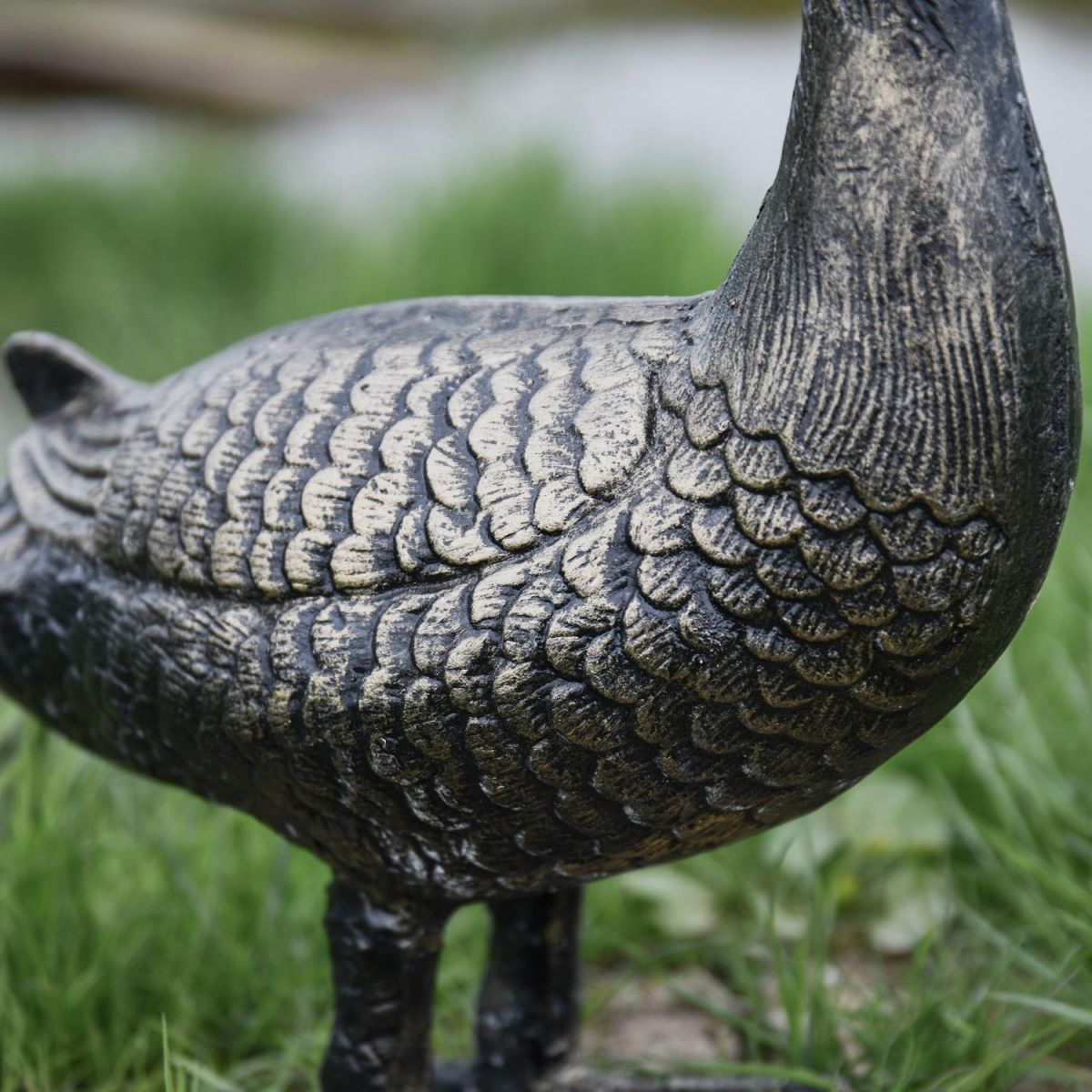 Close up of Body on Brushed Gold Standing Goose Sculpture