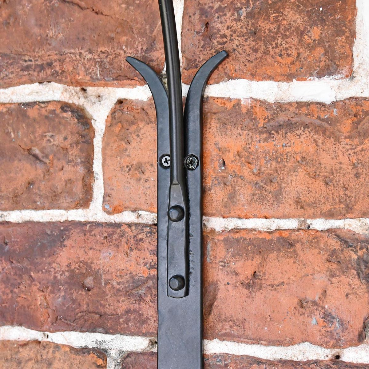 View of the Fixing Plate Mounted on a Brick Wall