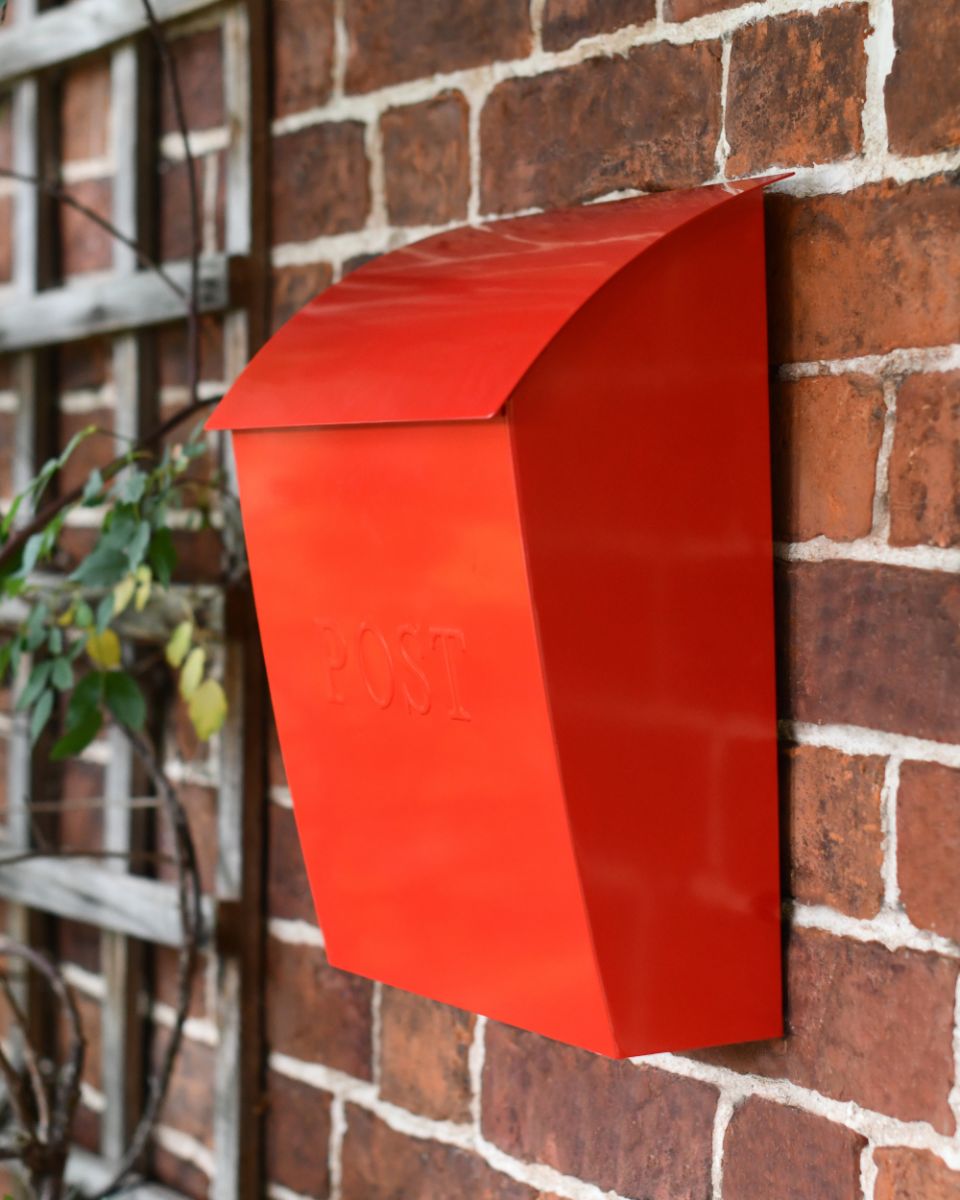 Side Of The Billingham Post Box In Red
