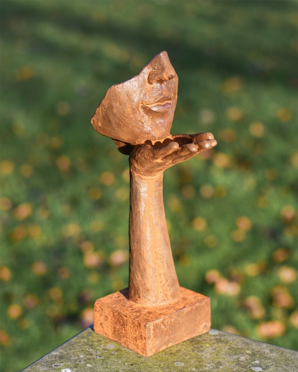 Rustic Cast Iron Blowing a Kiss Garden Sculpture