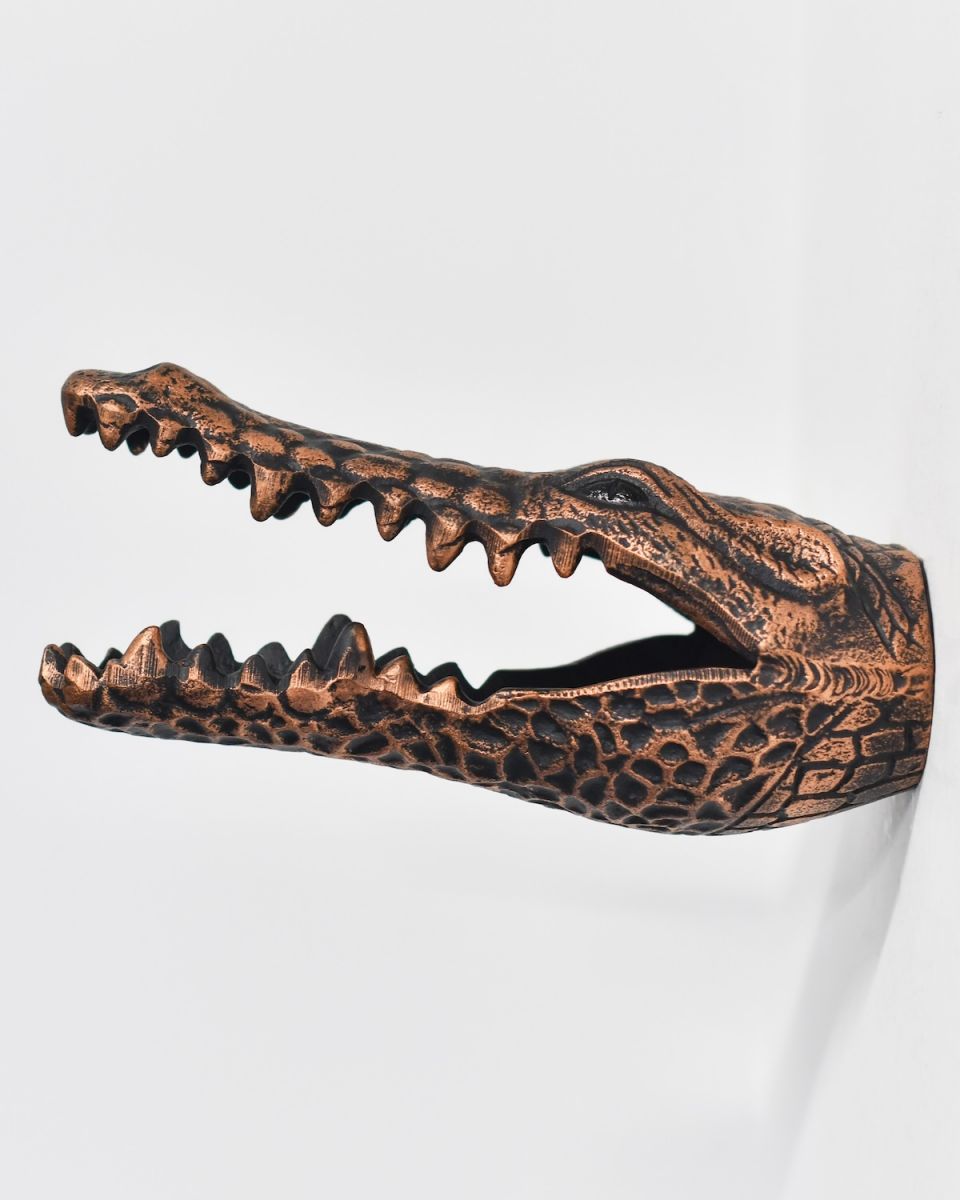 Side view of crocodile animal wall bust