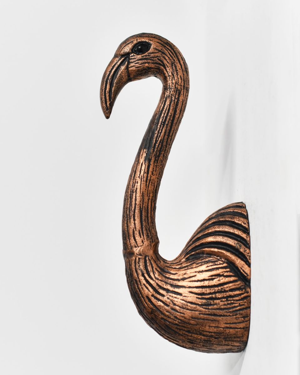 Side view of copper flamingo wall bust