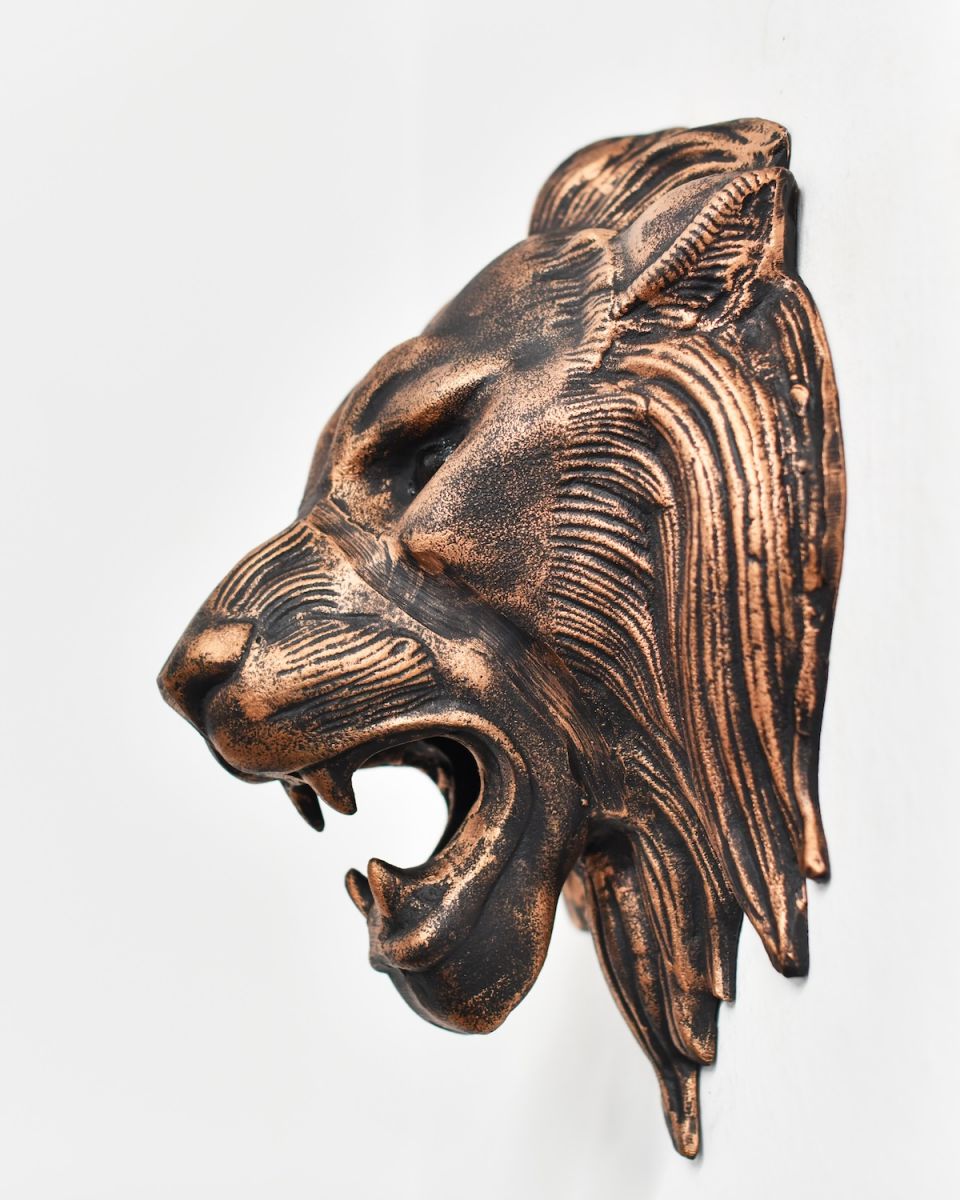 Side view of copper wall bust