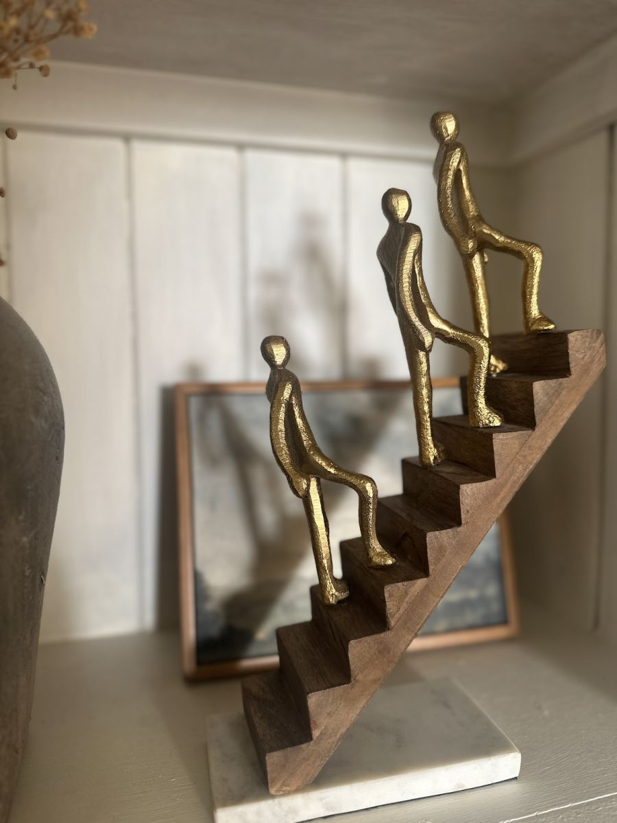 Side view of aluminium, mango wood and marble interior ornament