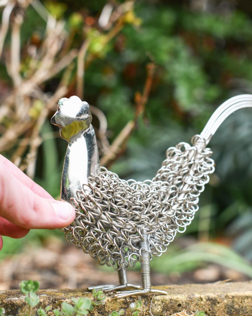 Scale Shot of Silver Rooster Wire Sculpture