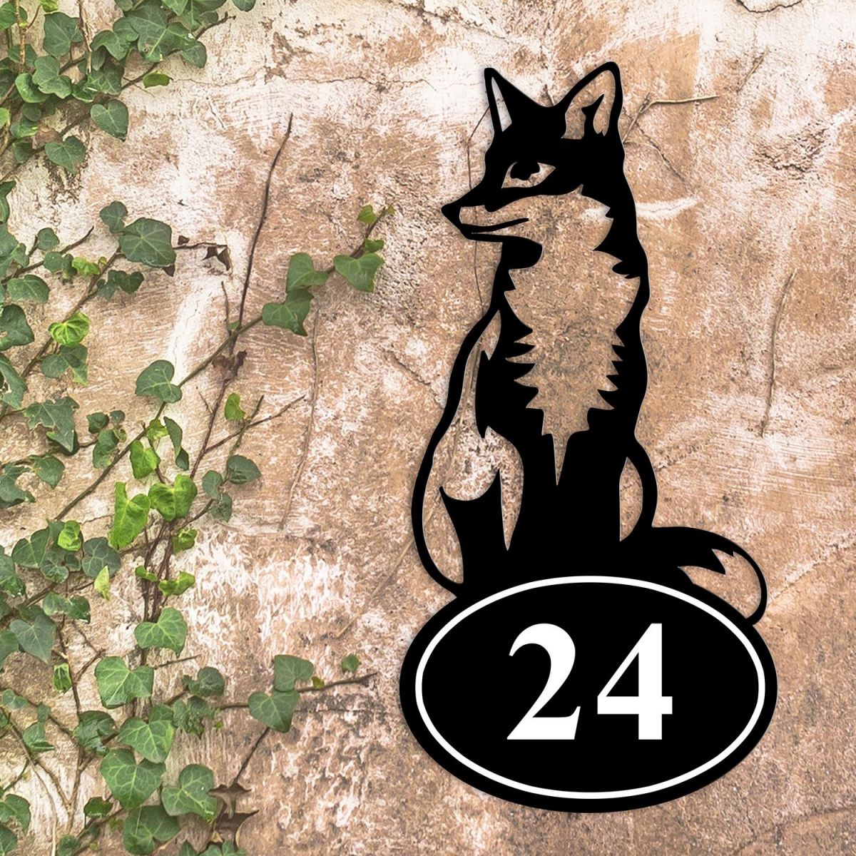 Sitting Fox Iron House Number Sign in Situ on a Rustic Wall 