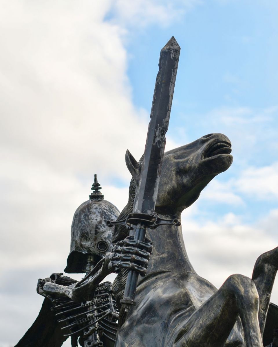 Close up of Skeleton Warrior Cavalry Recycled Metal Sculpture sword