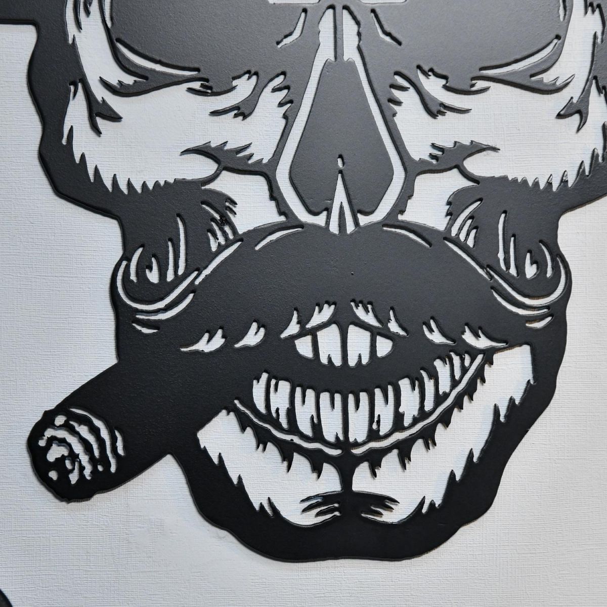 Close up of moustache, cigar and teeth on Gangster Skull