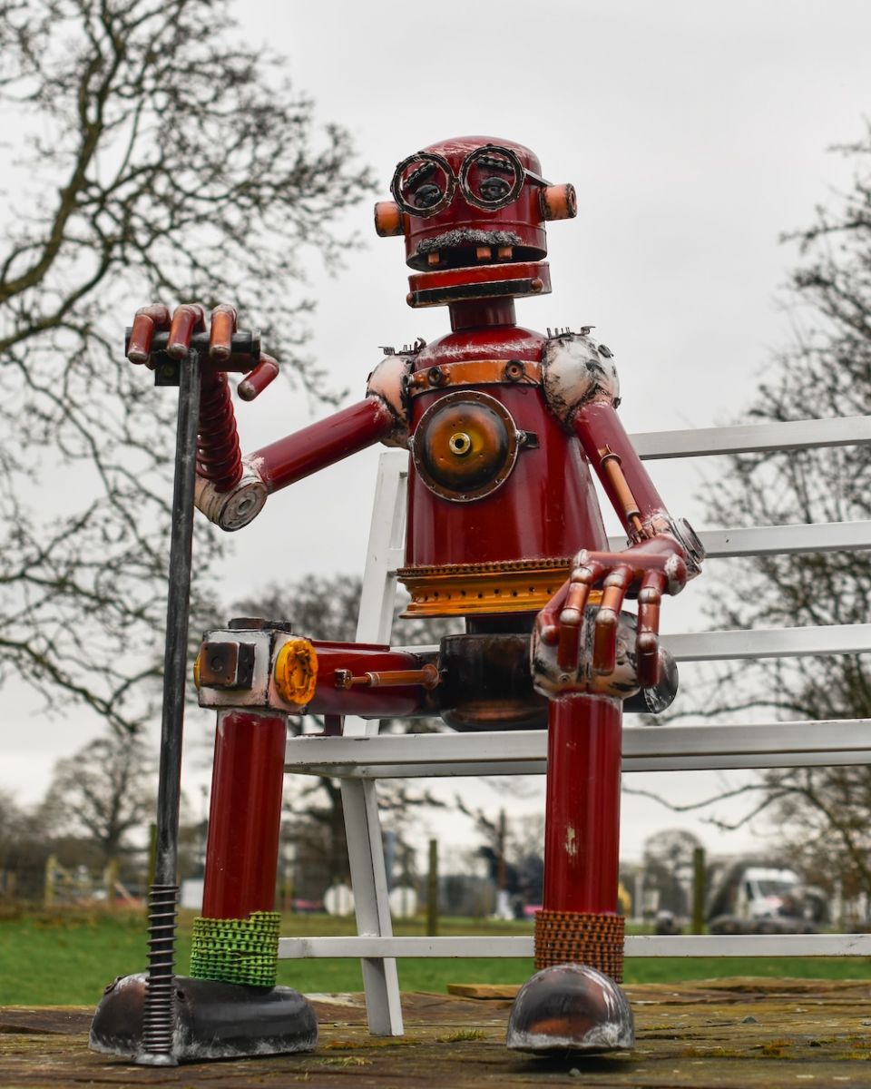 Close up of robot detail on garden bench