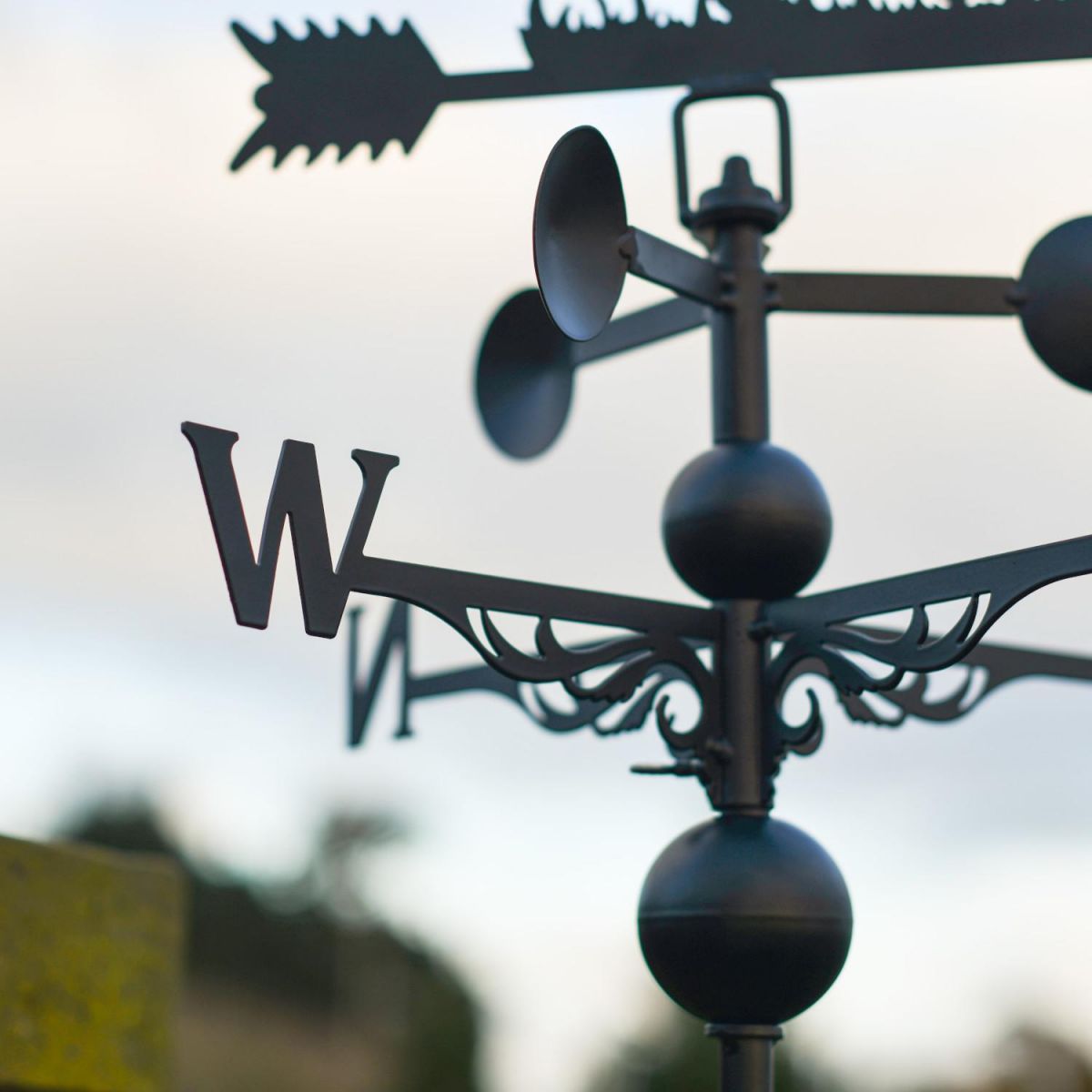 Close-Up of Directional Arms on Barn Owl Weathervane