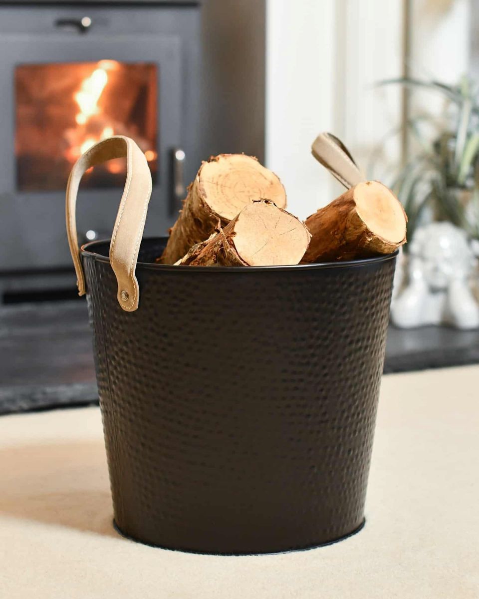 Small Black Contemporary Dotted Log Basket in Situ