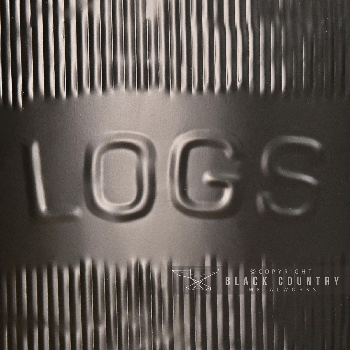 "Logs" Embossed on the side of the Log Baskets