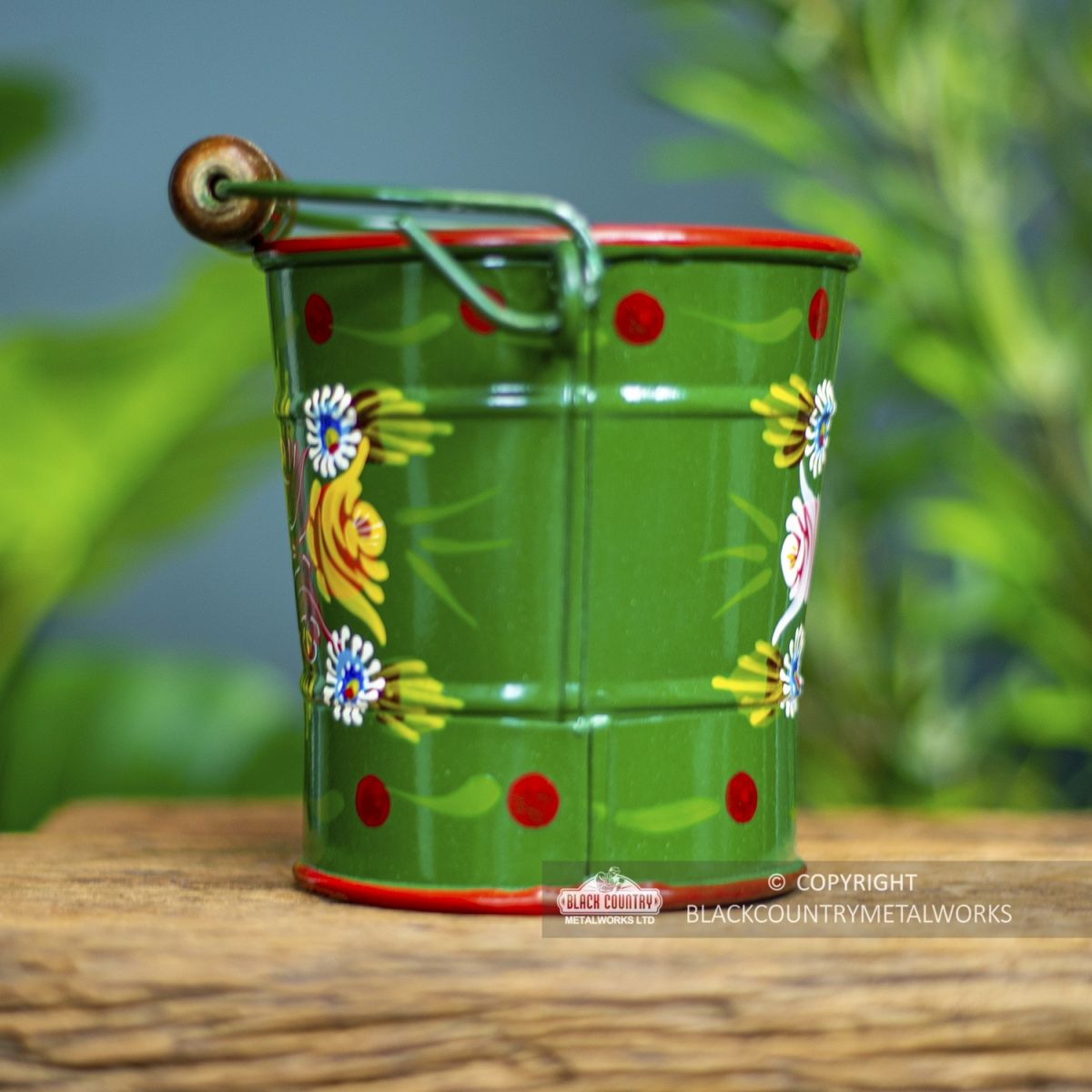 Side view of the Small Green Narrowboat Hand Painted Bucket
