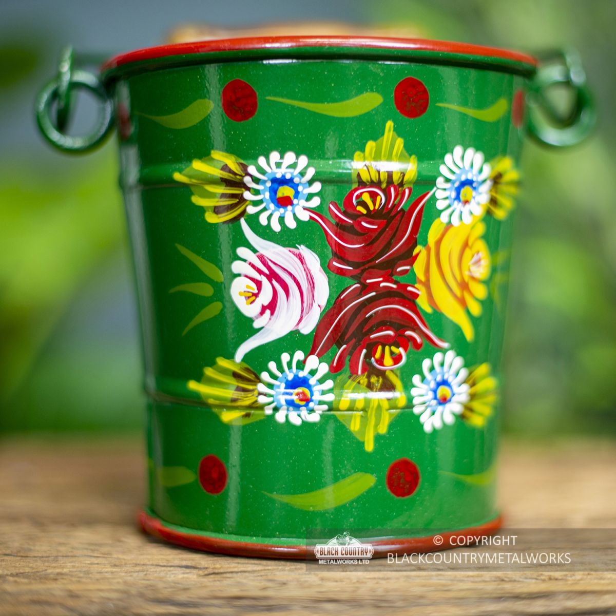 close-up of the Hand Painted Rose Design on the Bucket