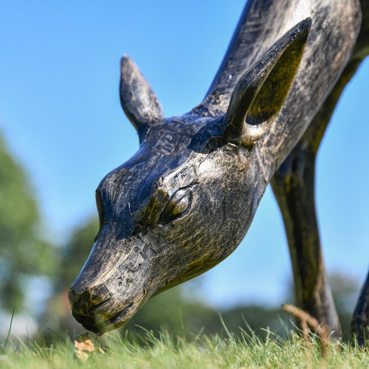 Close-Up of Grazing Deer Sculpture