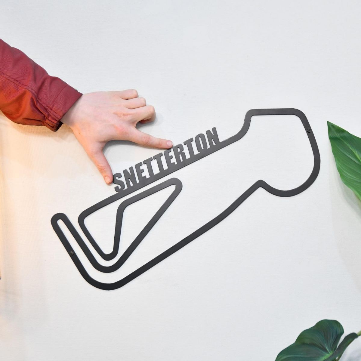 Snetterton Race Track with hand for scale 