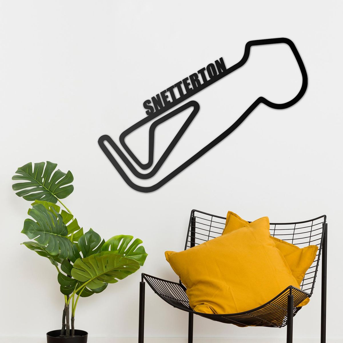 Snetterton Race Track Wall Art on the Wall Next to Plants