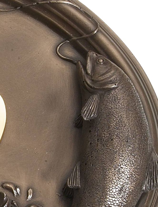 Close up of fish on house number plaque Close up of fish on house number plaque