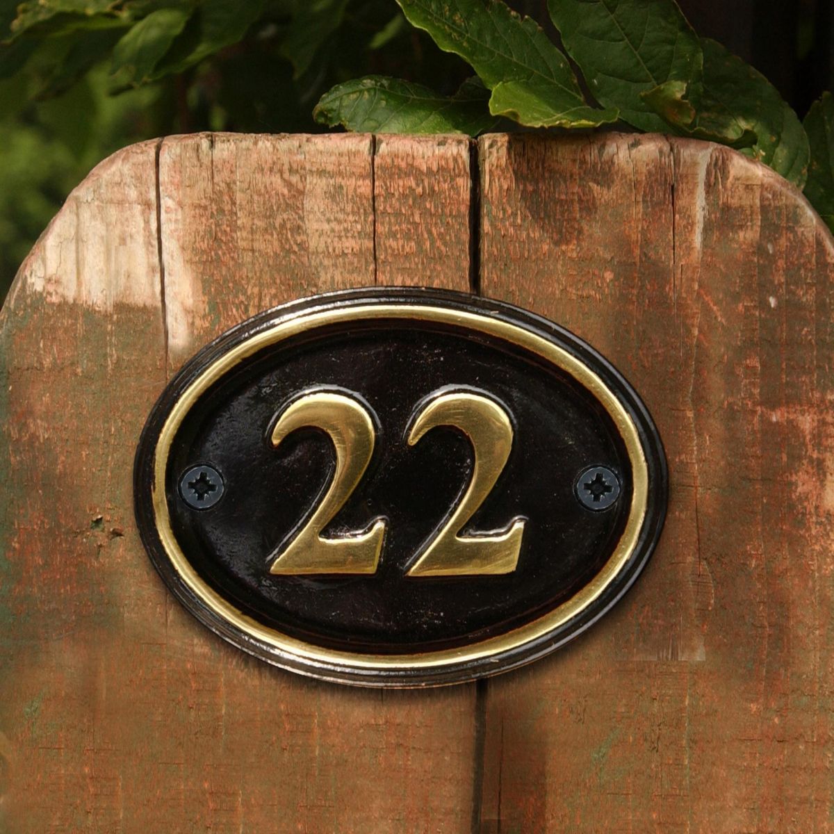 Polished Brass & Black Oval House Number on Fence