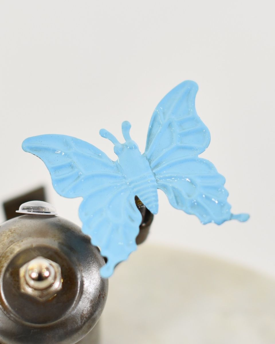 "Sprocket" the Upcycled Metal Home Ornament close up of blue butterfly
