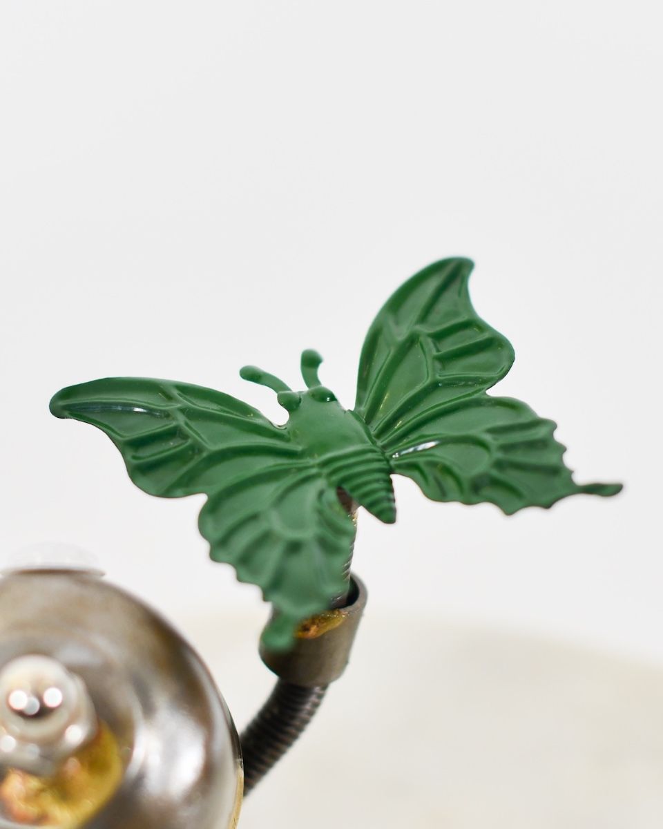 "Sprocket" the Upcycled Metal Home Ornament close up of green butterfly