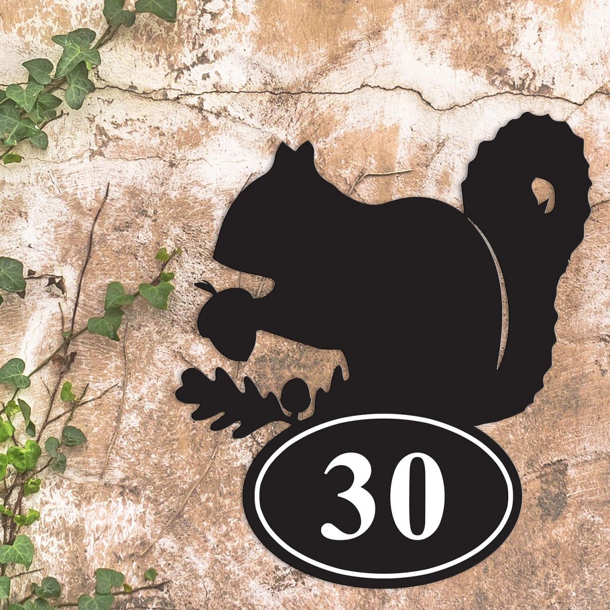 Squirrel Iron House Number Sign in Situ a Rustic Wall