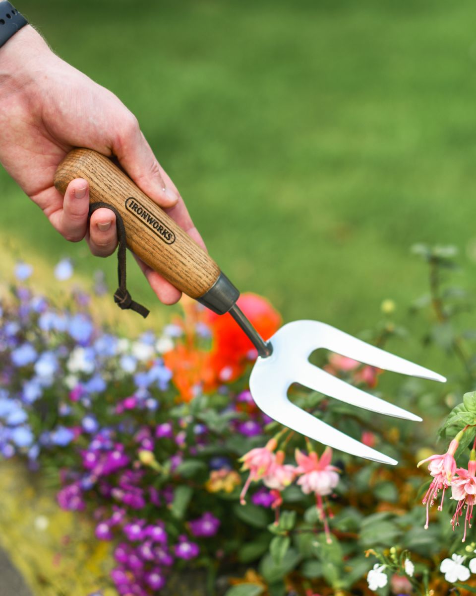 Stainless steel gardening trowel with wooden handle Stainless steel gardening trowel with wooden handle