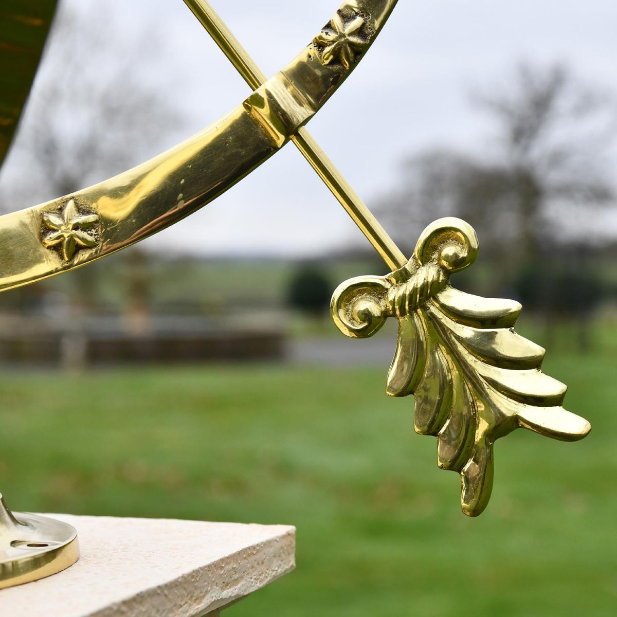 Close-up of the Polished Brass Fletch on the Arrow of the Serpent Armillary