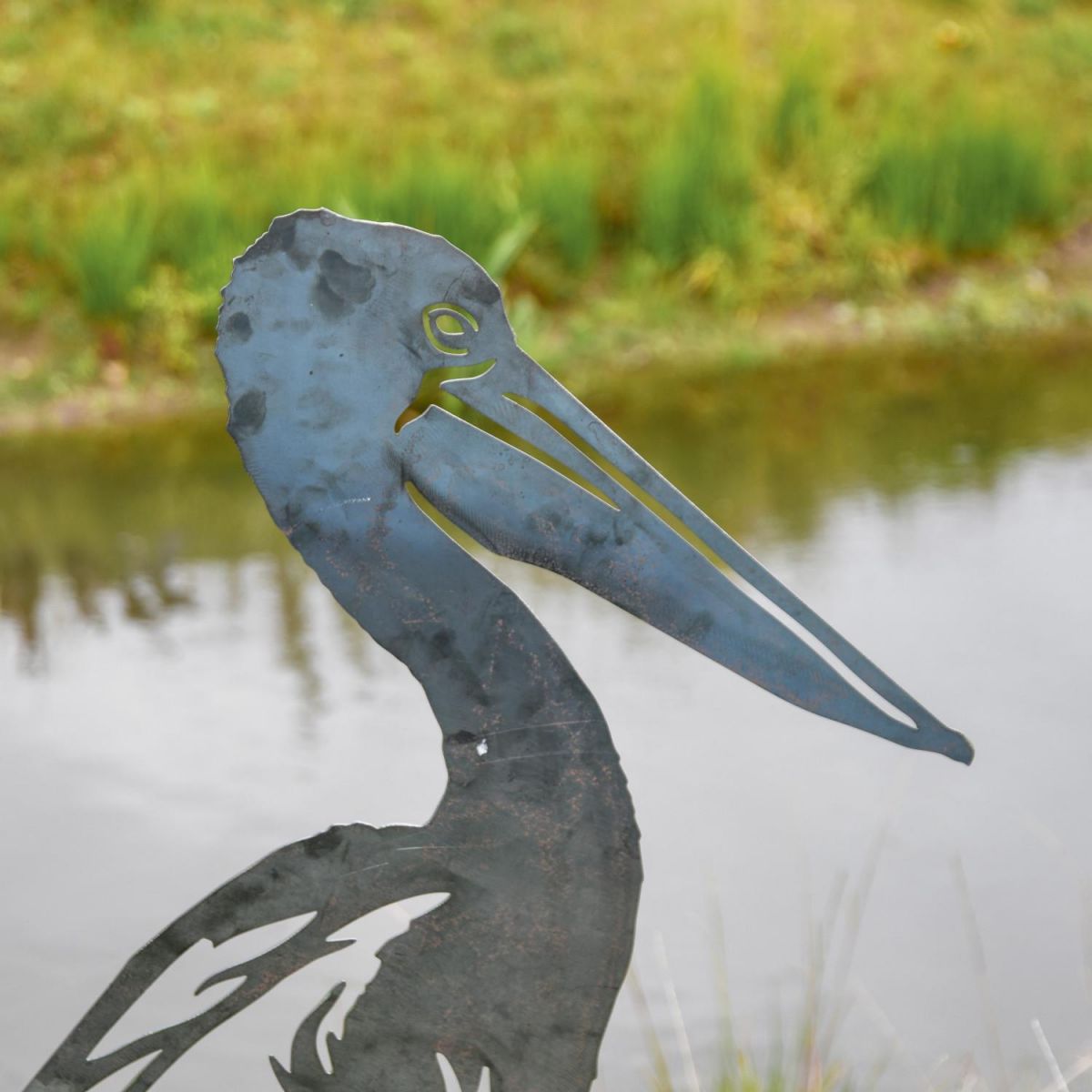 Close-Up of Standing Pelican Sheet Steel Silhouette in Natural Steel Finish