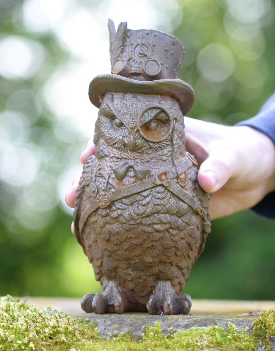 Scale of Cast Iron Steampunk Owl Sculpture