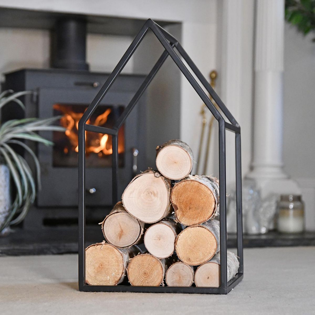 "Town House" Iron Log Rack Holding Logs in the House "Town House" Iron Log Rack Holding Logs in the House