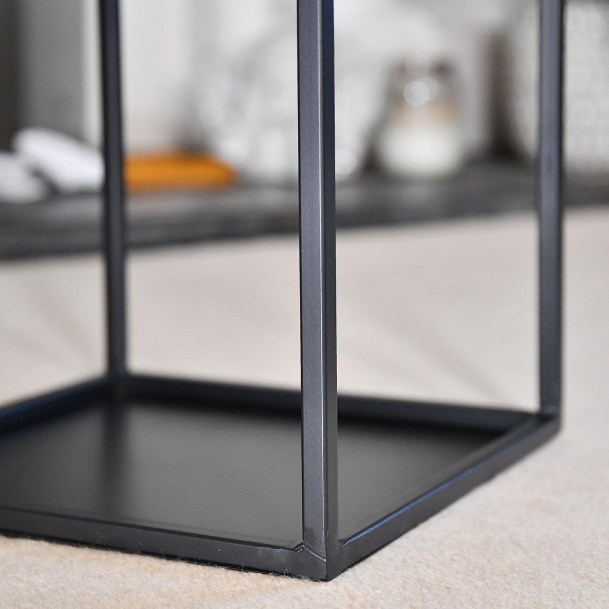 Close-up of the Base of the "Town House" Iron Log Rack Close-up of the Base of the "Town House" Iron Log Rack