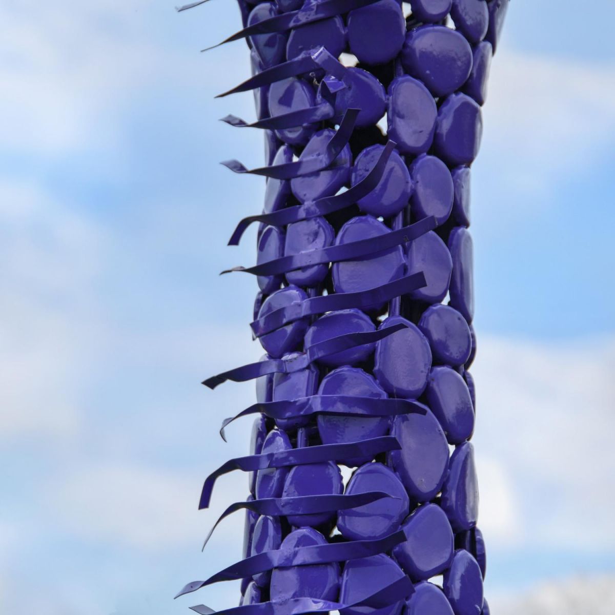 Close-Up of Steel "Lady Jengo" Baby Giraffe Sculpture - Purple