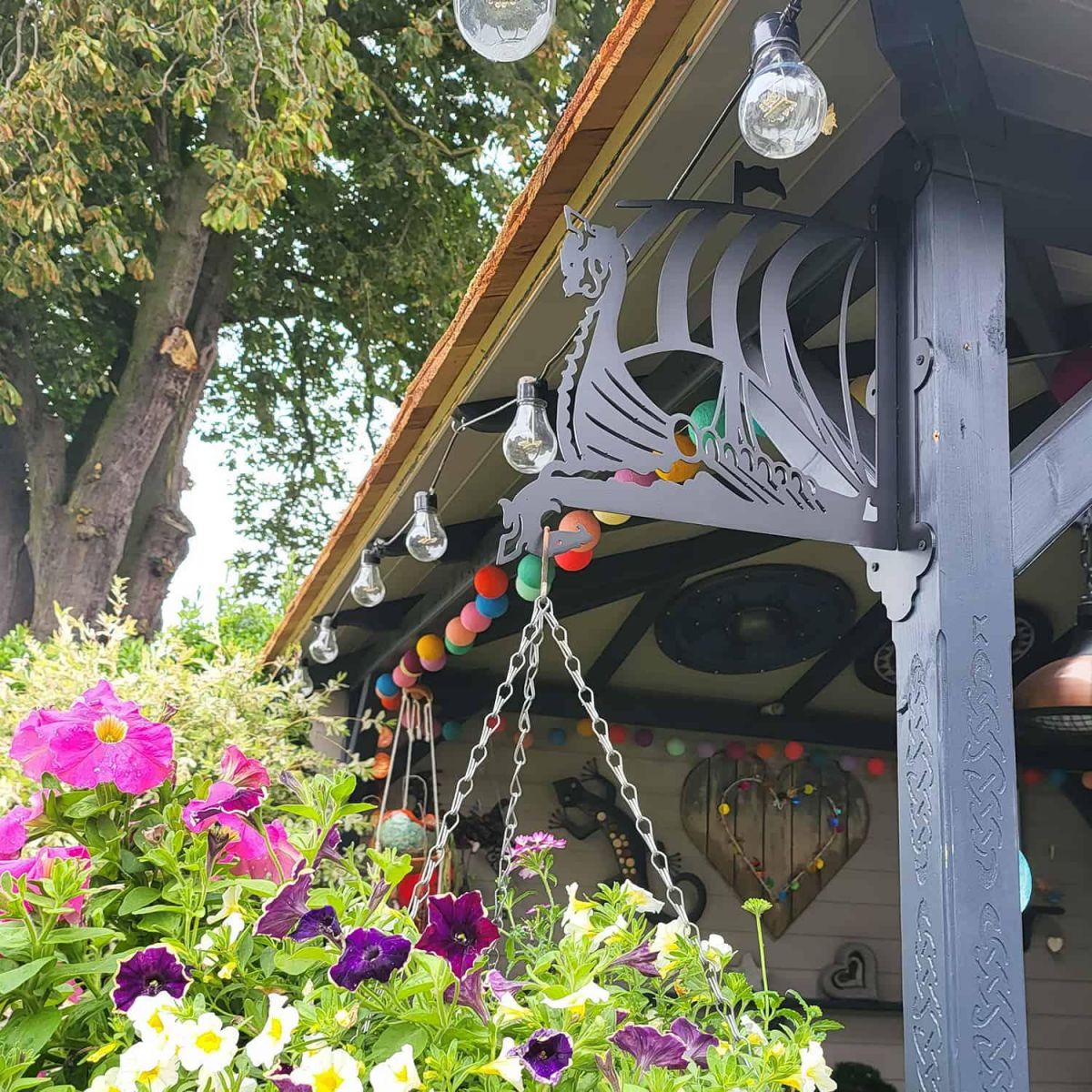 Example of Steel Viking Ship Hanging Basket Bracket in Situ Example of Steel Viking Ship Hanging Basket Bracket in Situ
